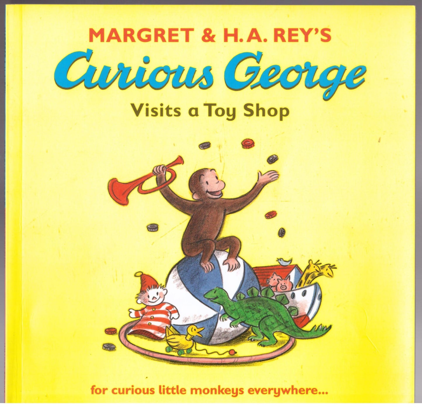 Curious George Visits a Toy Shop by Margret & H. A Rey’s